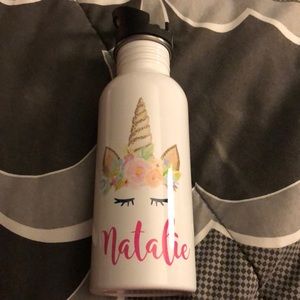 Flask water bottle that has Natalie on it.